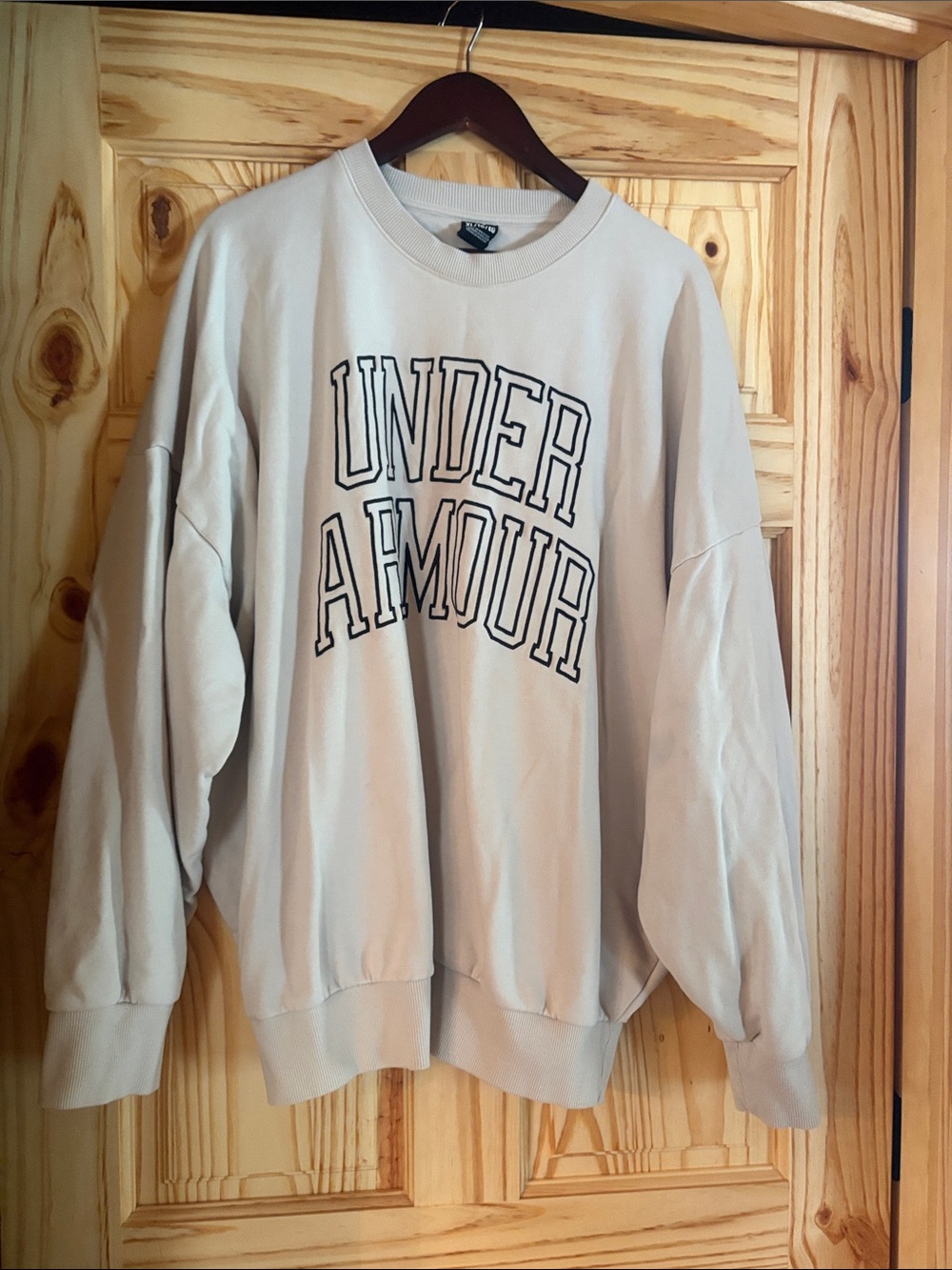Under Armour Cream Crewneck Sweatshirt with Black Lettering